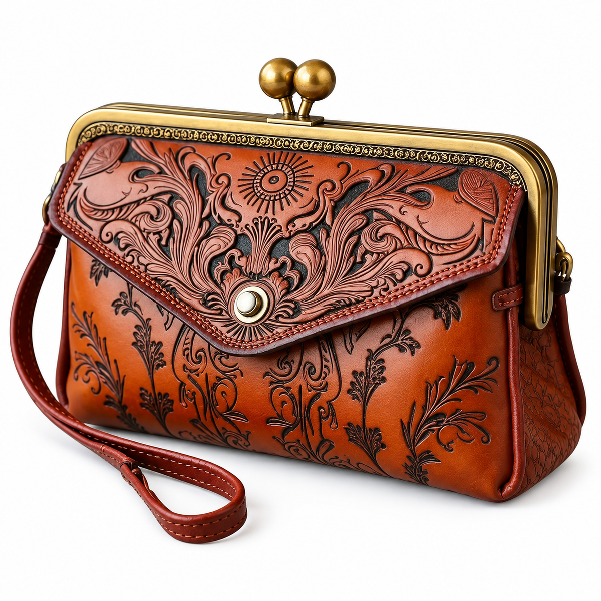 A brown tooled leather kiss-lock handbag with an embossed floral pattern, gold-tone metal frame, and a matching leather wristlet strap, shown on a white background.