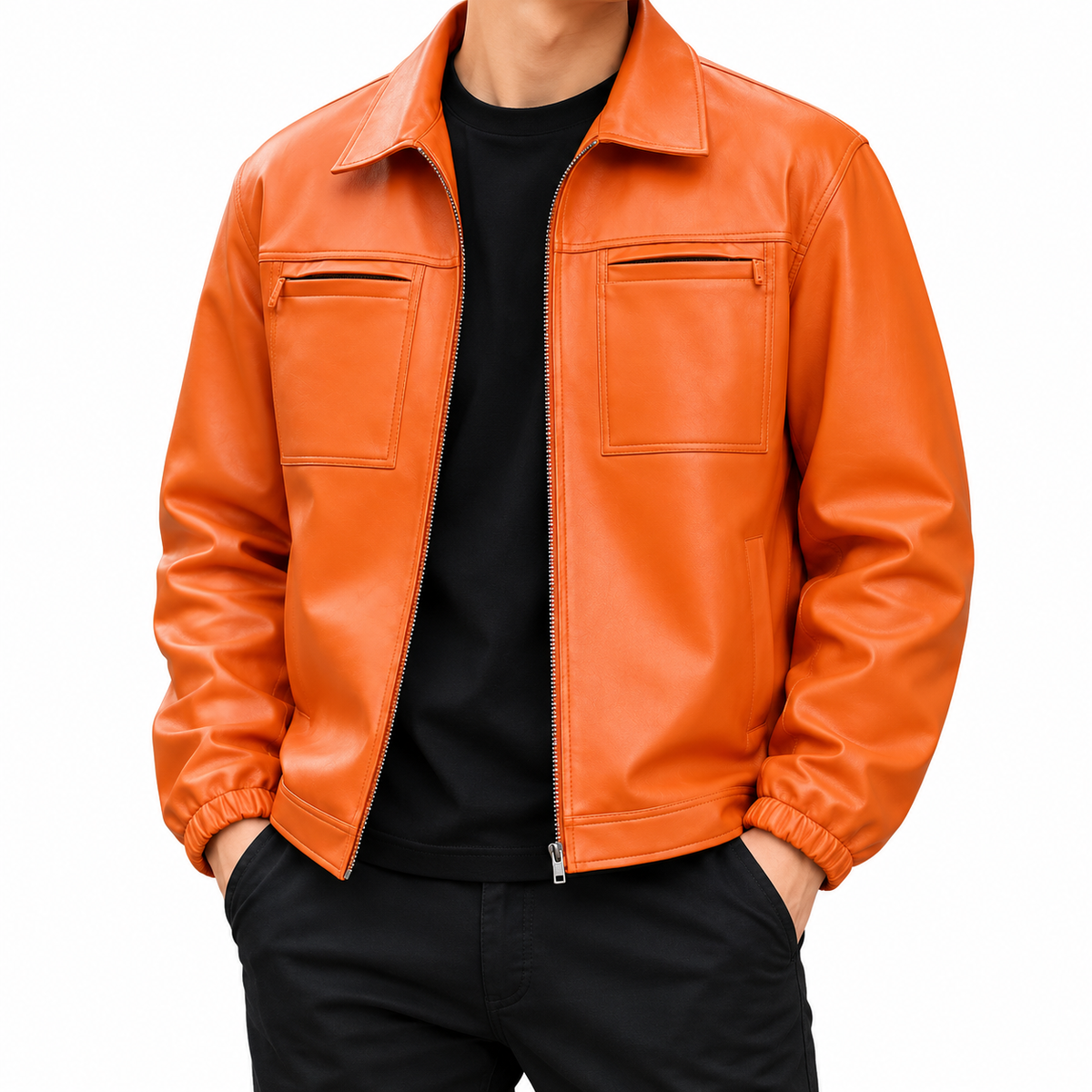 A man wearing a bright orange faux leather jacket over a black t-shirt and black pants, shown from the neck down against a plain white background.