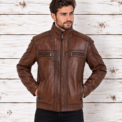 A man wearing a brown leather jacket with a high collar, front zipper, and zippered chest pockets