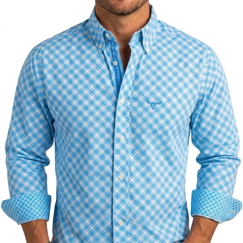 A man wearing a light blue and white gingham long-sleeve button-down shirt with rolled-up sleeves showing a patterned lining, on a white background.