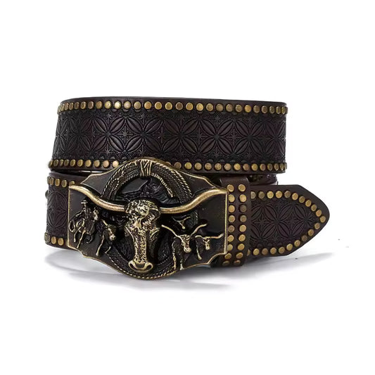 A dark brown tooled leather belt with a large bronze-toned buckle featuring a longhorn design, displayed on a clean white background.