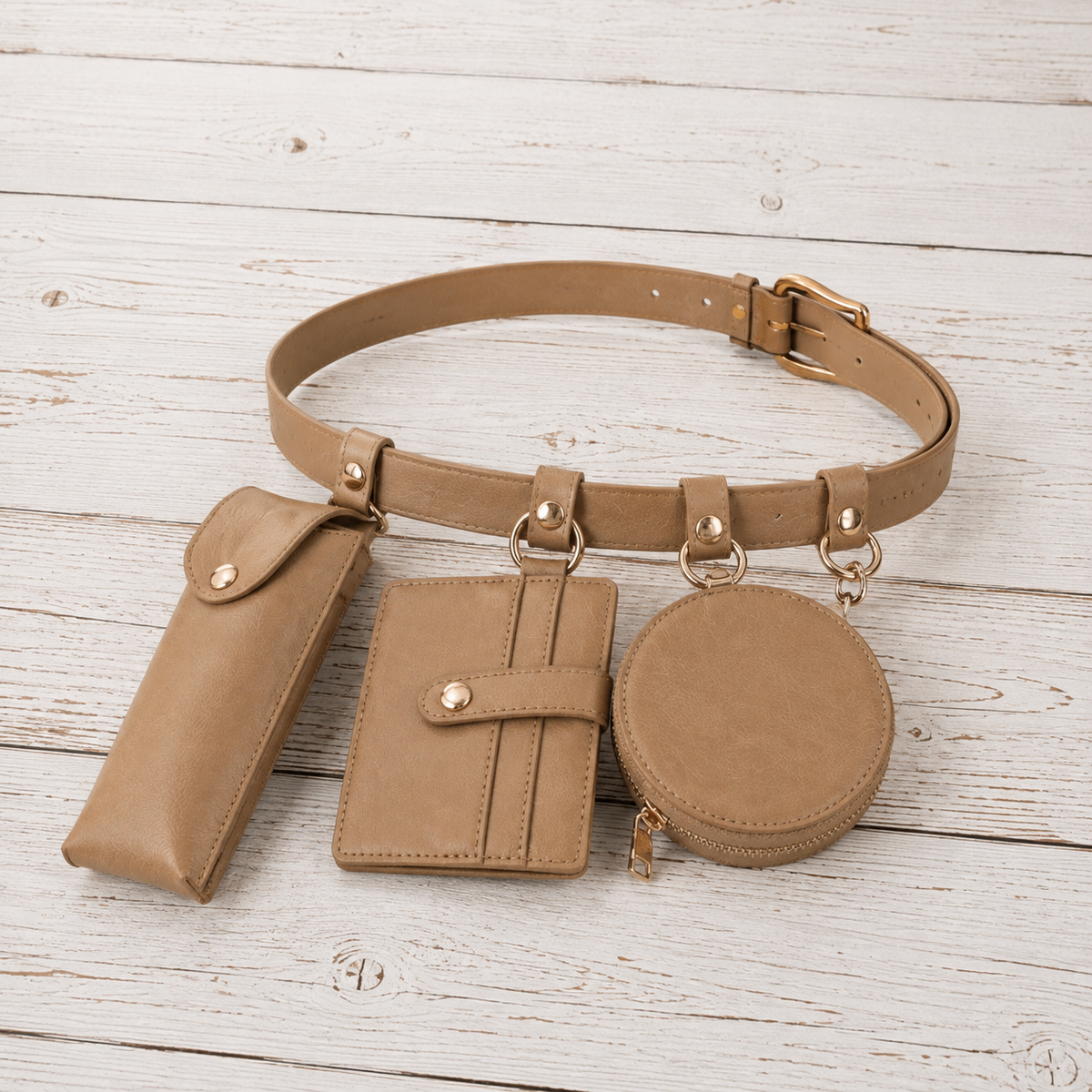 A tan faux-leather belt bag set with a matching adjustable waist belt, a vertical phone pouch, a horizontal card holder with a snap closure, and a round zipper coin pouch