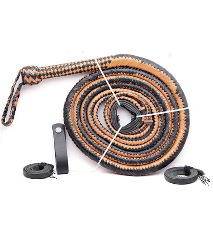 Coiled black and orange rope with metal clips on a white background
